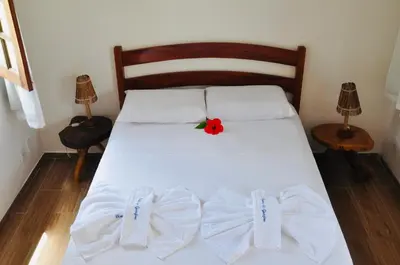 Uma cama ou camas num quarto em Pousada Ventos do Guajiru-Casa de Kitesurfistas
