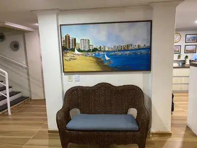 Uma área de estar em Hotel Casa De Praia