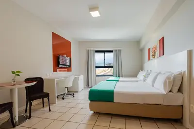 Uma cama ou camas num quarto em Bourbon Hotel Fortaleza