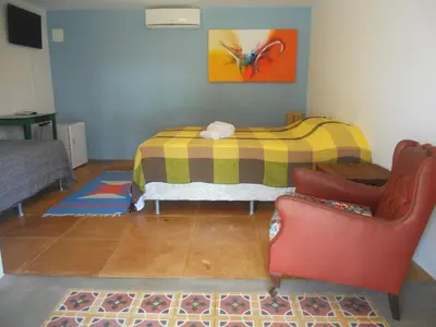 Uma cama ou camas num quarto em Pousada Temperança