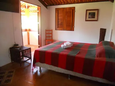 Uma cama ou camas num quarto em Pousada Temperança