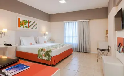 Uma cama ou camas num quarto em Comfort Hotel Fortaleza
