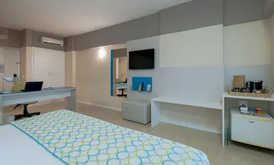 Uma cama ou camas num quarto em Comfort Hotel Fortaleza