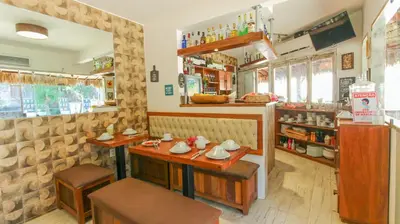 Um restaurante ou outro lugar para comer em Residence Bons Ventos Jeri