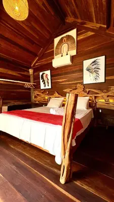 Uma cama ou camas num quarto em Xainã Pousada de Charme