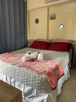 Uma cama ou camas num quarto em Landscape Beira Mar Fortaleza
