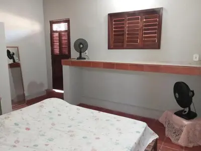 Uma cama ou camas num quarto em Hospedagem da Keila Matos