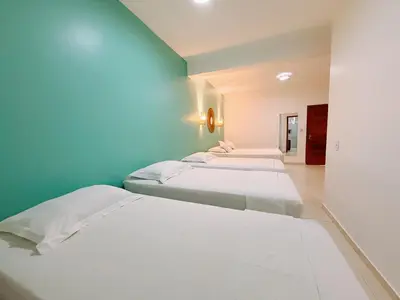 Uma cama ou camas num quarto em Pousada Jeri Dunas