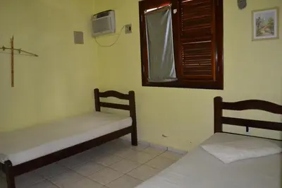 Uma cama ou camas num quarto em Casa de 4 quartos á 6Km da praia de Lagoinha-ce
