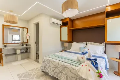Uma cama ou camas num quarto em VG Sun Cumbuco - Apartamento de Temporada na Praia do Cumbuco