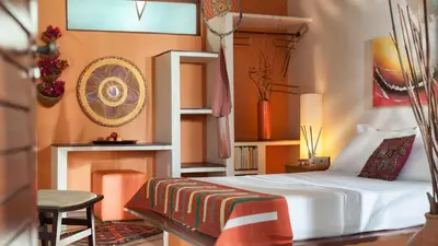 Uma cama ou camas num quarto em Araxá Pousada