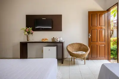 Uma cama ou camas num quarto em Jeri Village Hotel