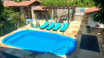 A piscina em ou perto de Pousada Casa Do Angelo