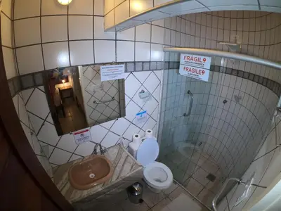 Uma casa de banho em Pousada Casa Do Angelo