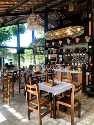 Um restaurante ou outro lugar para comer em Pousada Casa Do Angelo