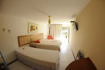 Uma cama ou camas num quarto em Pousada do Paiva
