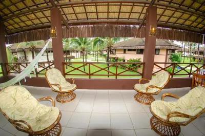 Uma área de estar em Bangalô Eco Residence Flecheiras