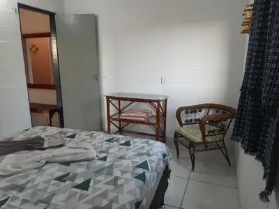 Uma cama ou camas num quarto em Pousada Alecrim