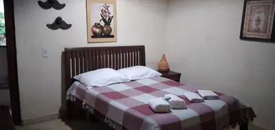 Uma cama ou camas num quarto em Casa de veraneio