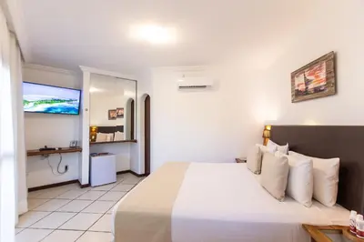 Uma cama ou camas num quarto em Duro Beach Hotel