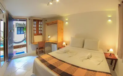 Uma cama ou camas num quarto em Azul Pousada