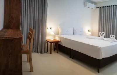 Uma cama ou camas num quarto em Azul Pousada