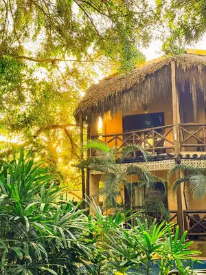 Um jardim no exterior de Kitecabana Pousada