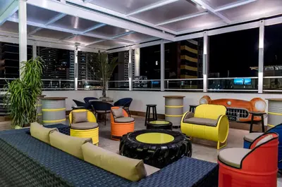 Uma área de estar em Hotel Villa Smart