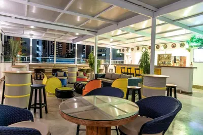 Uma área de estar em Hotel Villa Smart