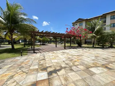Um jardim no exterior de VG Sun Cumbuco