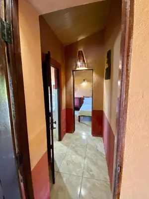 Uma cama ou camas num quarto em Pousada Le Monte Cristo
