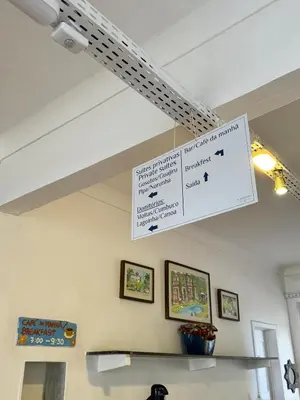 Um certificado, prémio, placa ou documento mostrado em Albergaria Hostel