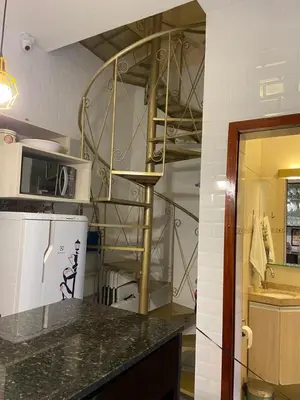 A cozinha ou kitchenette de LINDO CHALÉ NO CENTRO DE GUARAMIRANGA