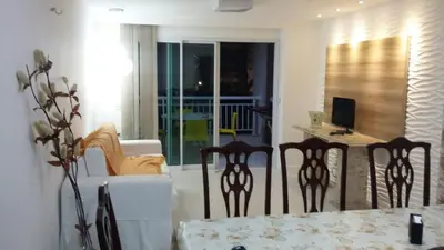 Uma área de estar em Apartamento em Golf Ville Resort