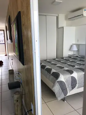 Uma cama ou camas num quarto em Apartamento Em Fortaleza De Frente Para O Mar