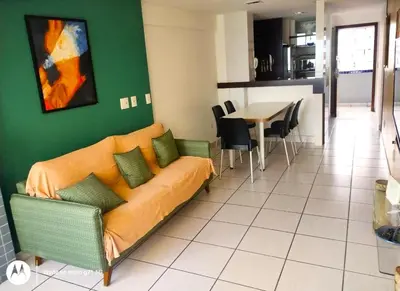 Uma área de estar em Apartamento Em Fortaleza De Frente Para O Mar