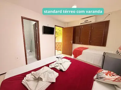 Uma cama ou camas num quarto em Pousada Sunrise Beach Cumbuco
