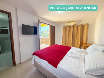 Uma cama ou camas num quarto em Pousada Sunrise Beach Cumbuco