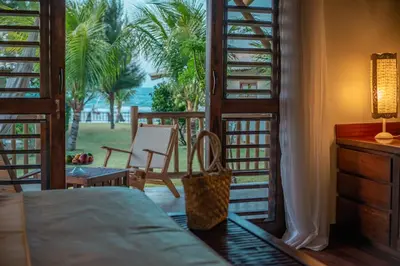 Uma cama ou camas num quarto em Vila Selvagem Hotel Contemporaneo