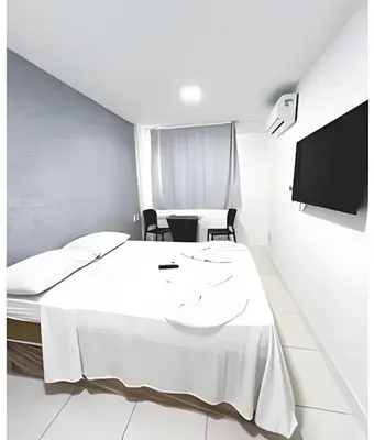 Uma televisão e/ou sistema de entretenimento em Brisa do Mar Apartments