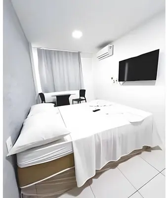 Uma televisão e/ou sistema de entretenimento em Brisa do Mar Apartments