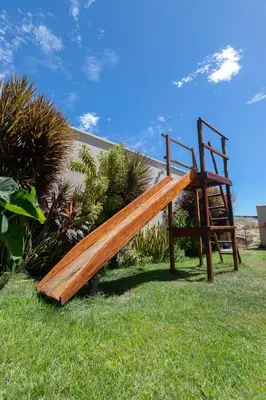 A área de jogos para crianças em SAN GIACOMO I Apartamentos por Temporada para amigos, famílias e empresas no Porto das Dunas - Ceará