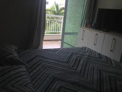 Uma cama ou camas num quarto em Apartamento à Beira Mar Porto das Dunas - Paraiso das Dunas
