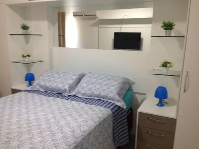 Uma cama ou camas num quarto em Apartamento com vista pro mar - Beach Way