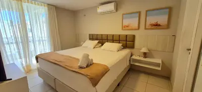 Uma cama ou camas num quarto em Atlantic Palace Family inn