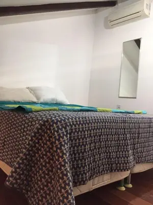 Uma cama ou camas num quarto em Apartamento Taíba Beach Resort