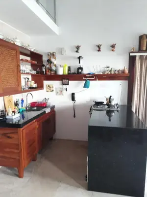 A cozinha ou kitchenette de Apartamento Taíba Beach Resort
