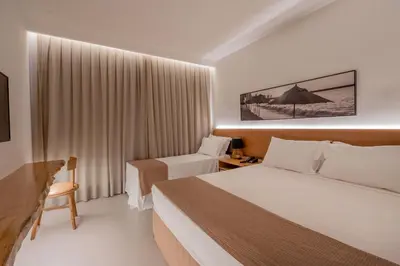 Uma cama ou camas num quarto em Pauli Boutique Hotel
