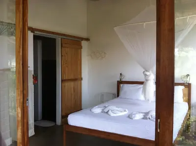 Uma cama ou camas num quarto em Casa da Gwen