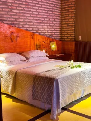 Uma cama ou camas num quarto em Canoé Brasil